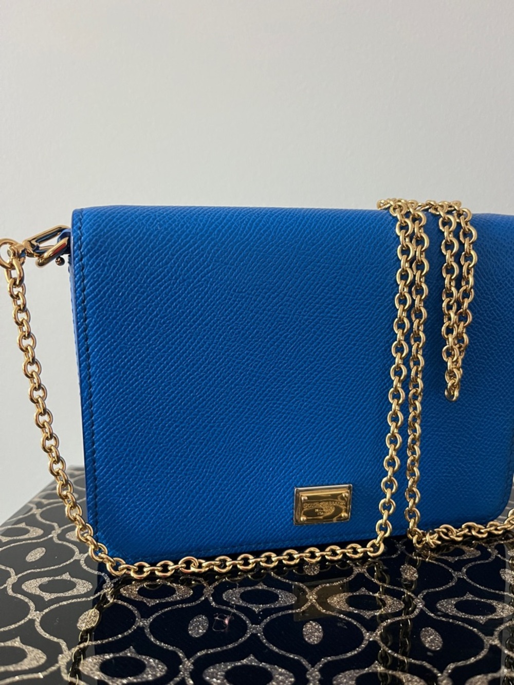Blue Leather Crossbody Bag with Dolce Gabbana.